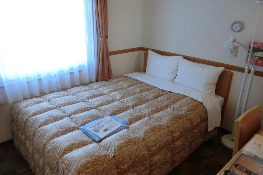 Toyoko Inn Hokkaido Sapporo-eki Nishi-guchi Hokudai Mae Eksteriør billede