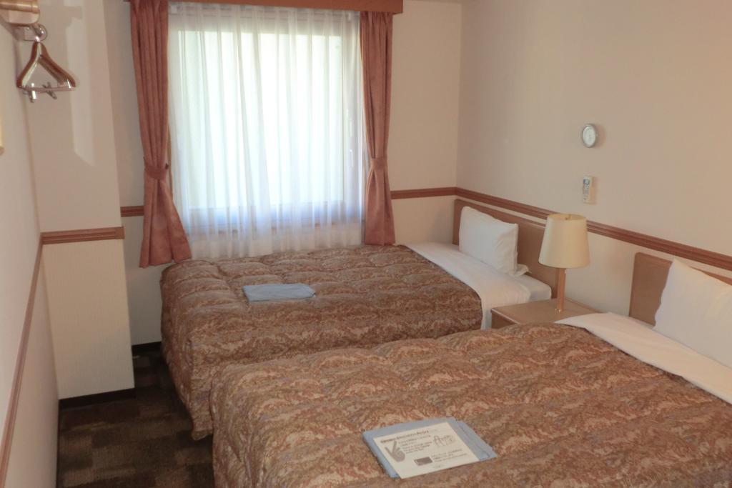 Toyoko Inn Hokkaido Sapporo-eki Nishi-guchi Hokudai Mae Eksteriør billede