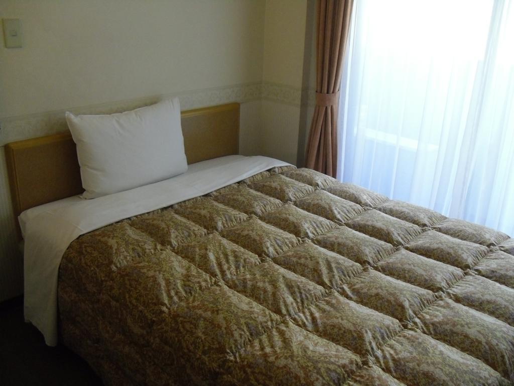 Toyoko Inn Hokkaido Sapporo-eki Nishi-guchi Hokudai Mae Eksteriør billede